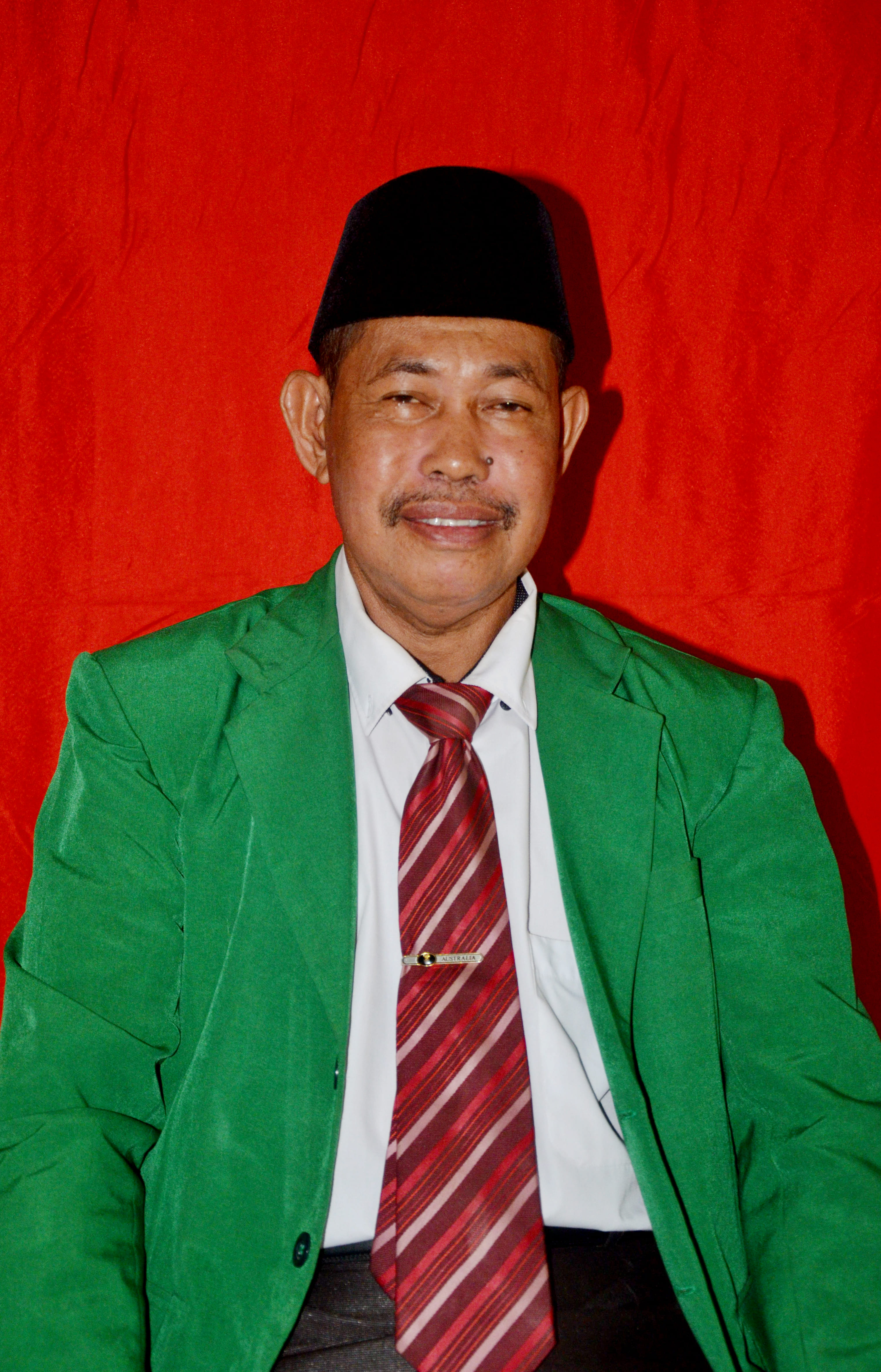 Dr.. Ir. Andi Suarda, M.Si