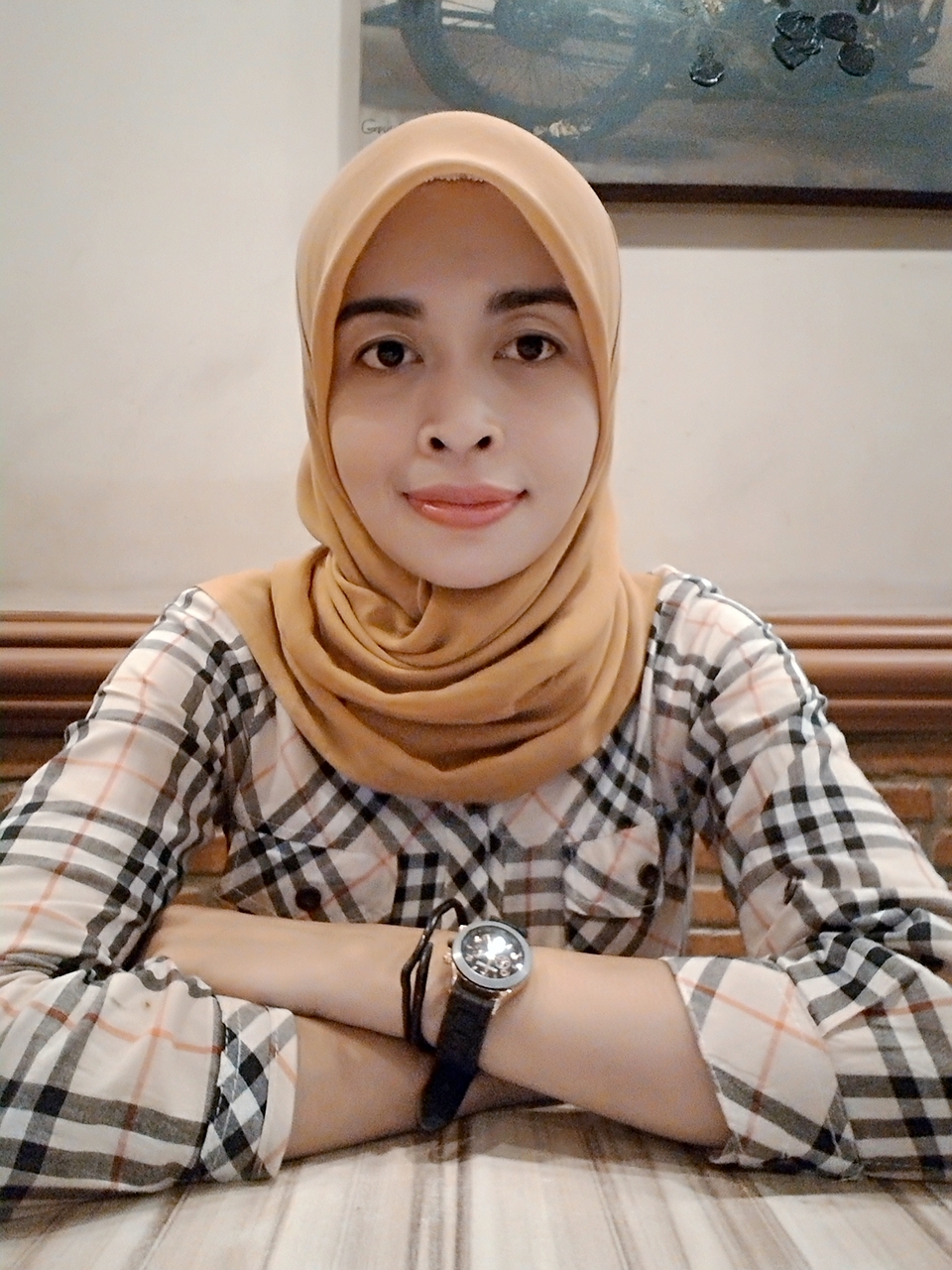 Syahriani Syam, ST